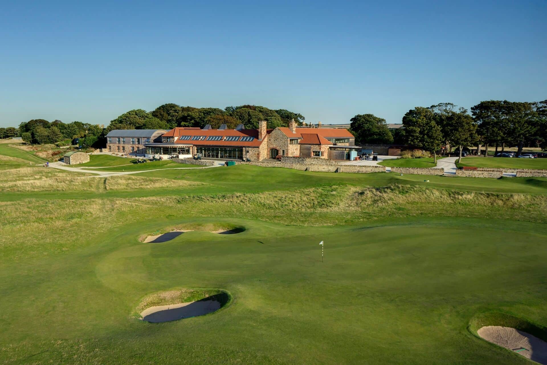 The 9th Green and clubhouse at Craigielaw Golf Club